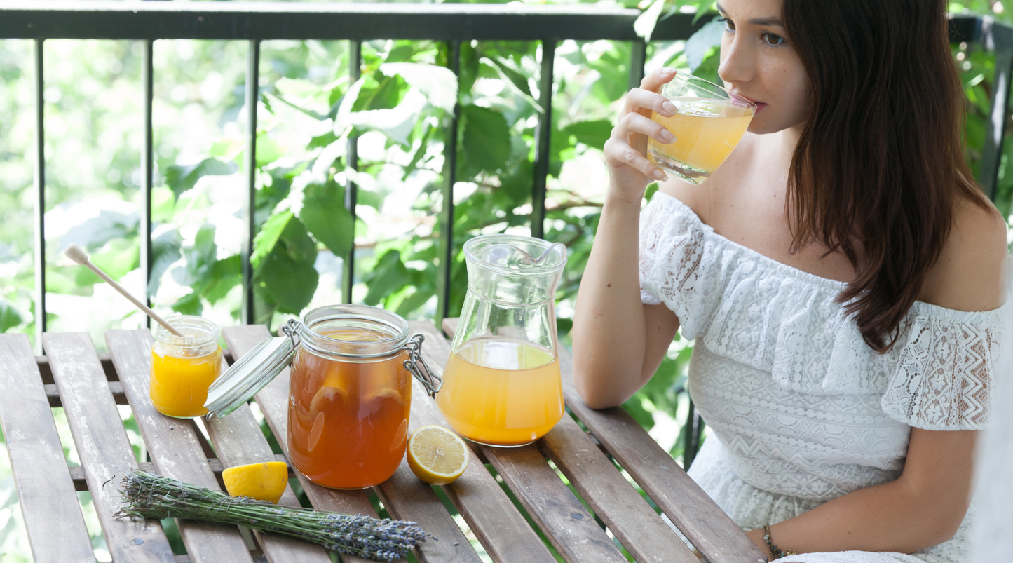 woman drinking kombucha